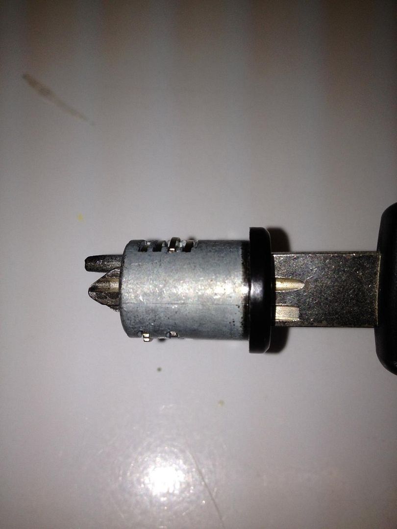 Glove box lock cylinder replacement
